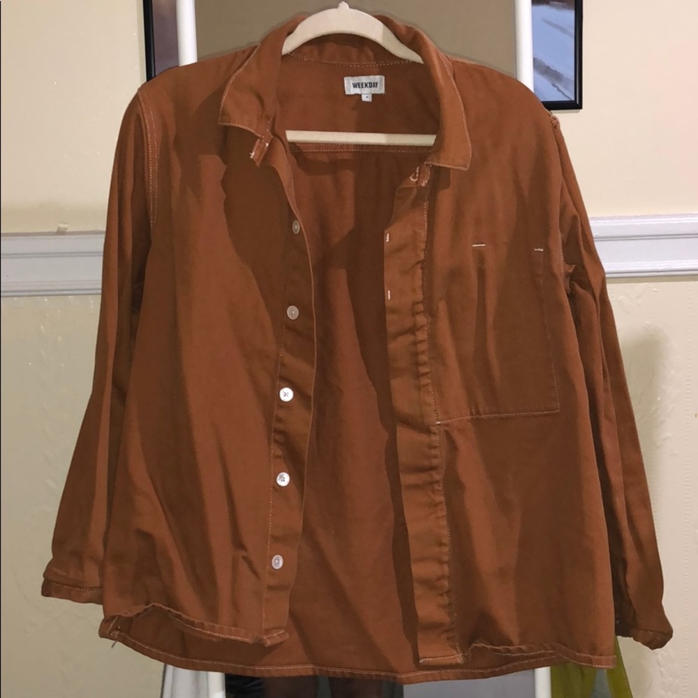 Orange rust color light jacket